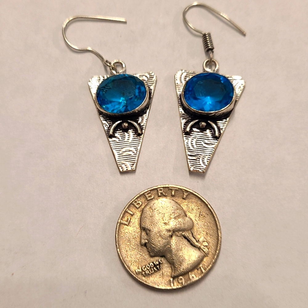 Silver blue topaz dangle artistic earrings